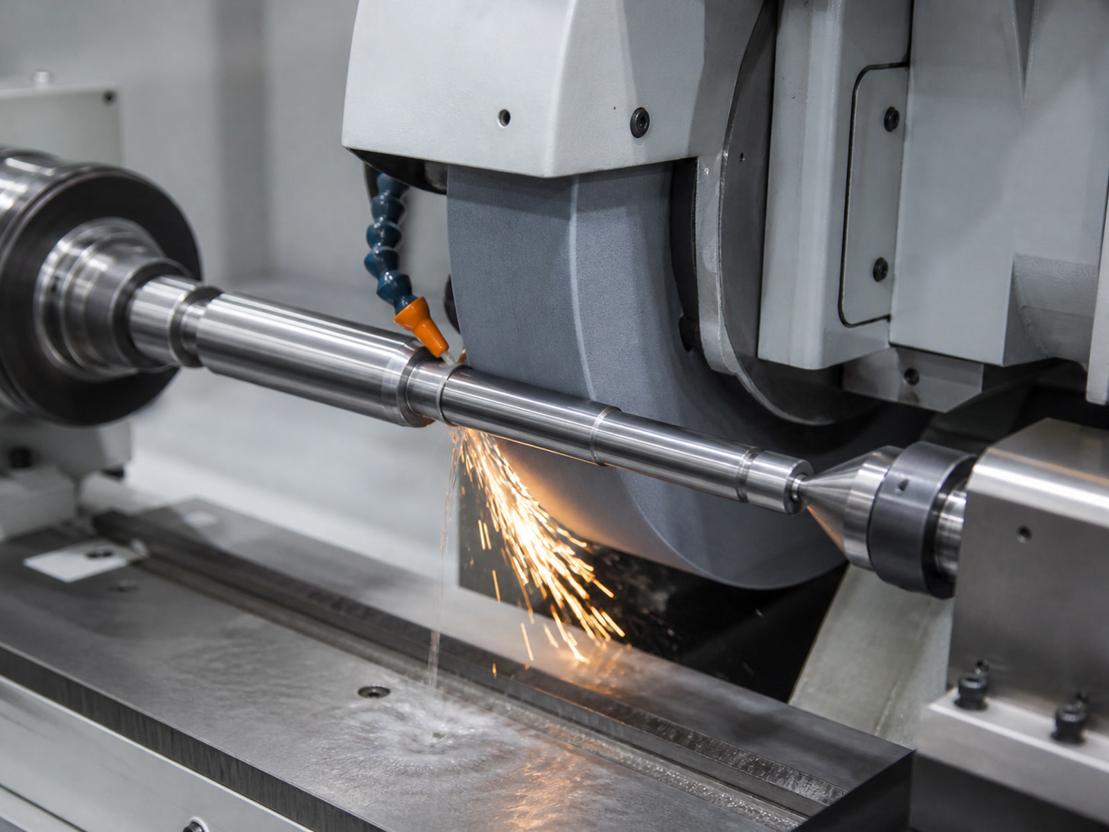 Precision cylindrical grinding machine processing a difficult alloy component